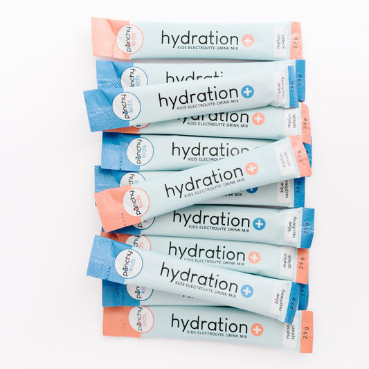 hydration + kid electrolyte sticks melon splash and blue raspberry stacked neatly